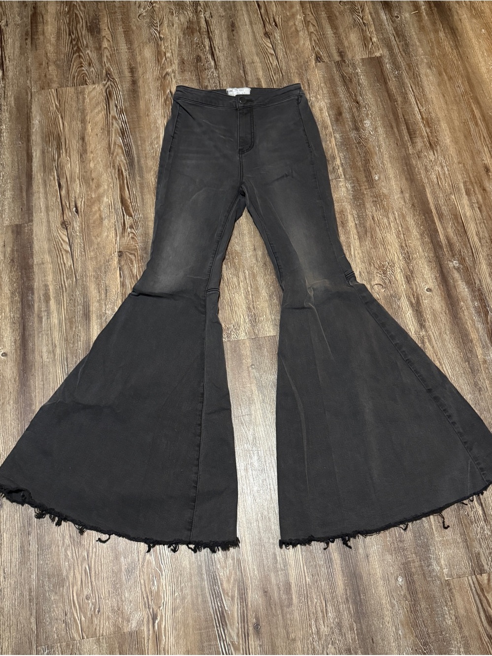 Free People Just Float On Jeans Women's 26 High Rise Raw Hem Bell Bottom in Blac